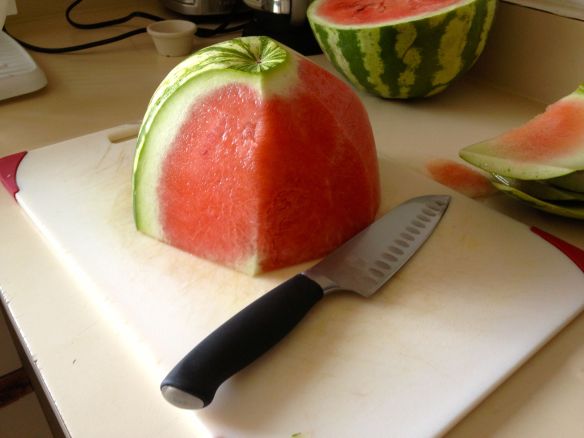 Watermelon with half of the rind removed