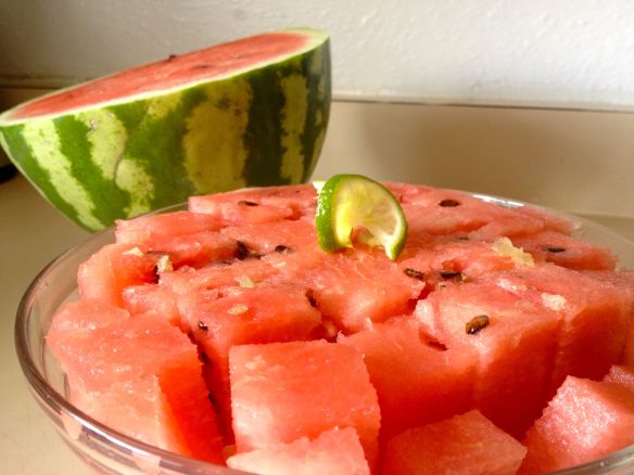 Watermelon in a bolw with a lime wedge